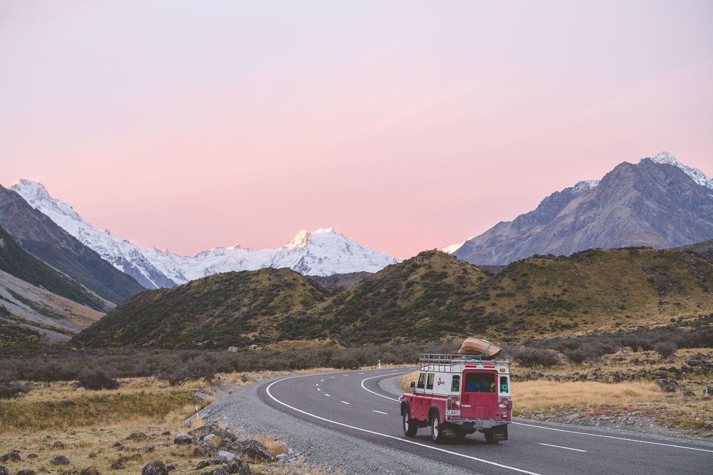 Deuce Rover driving at sunrise through Mount Cook National Park