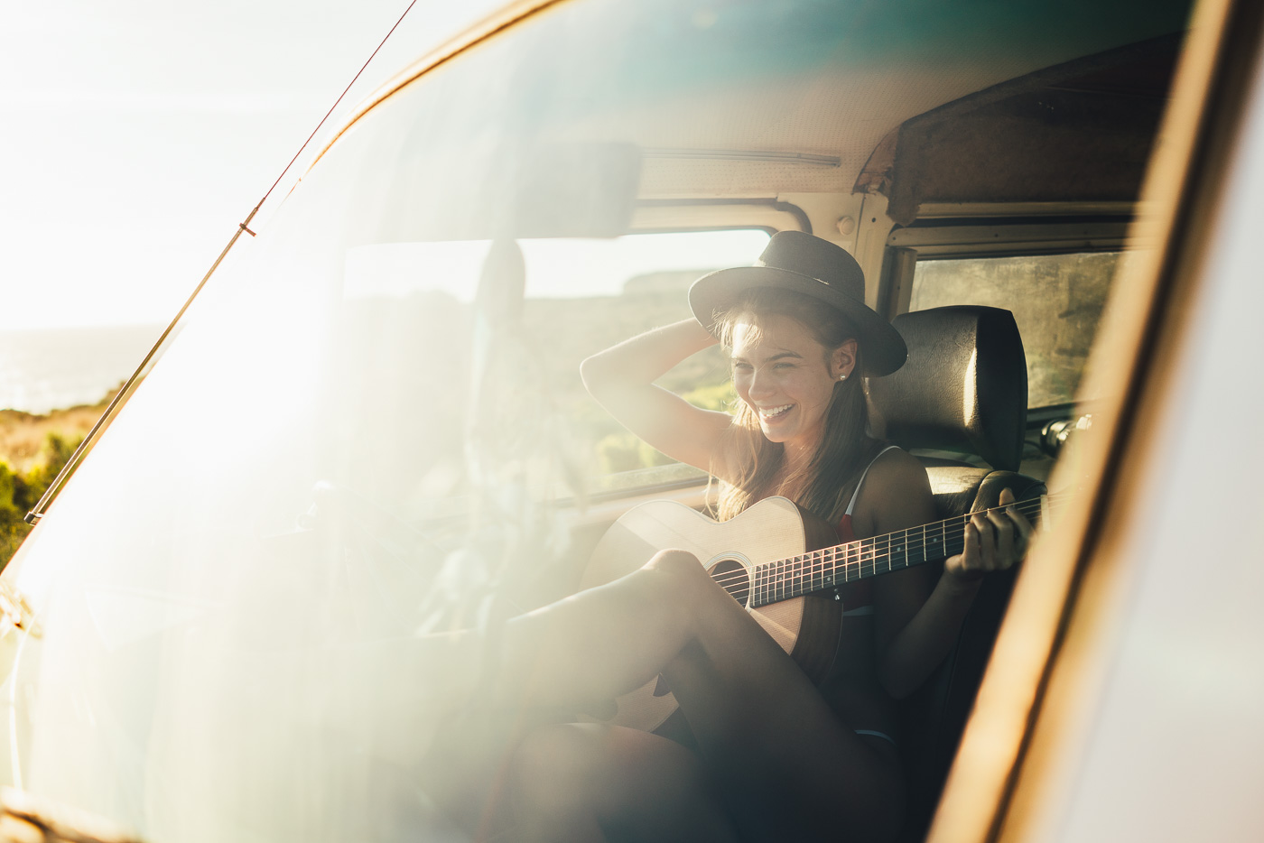 Tristyn Lecia playing guitar in the Volkswagen Van. Photo by Sony Ambassador Stefan Haworth