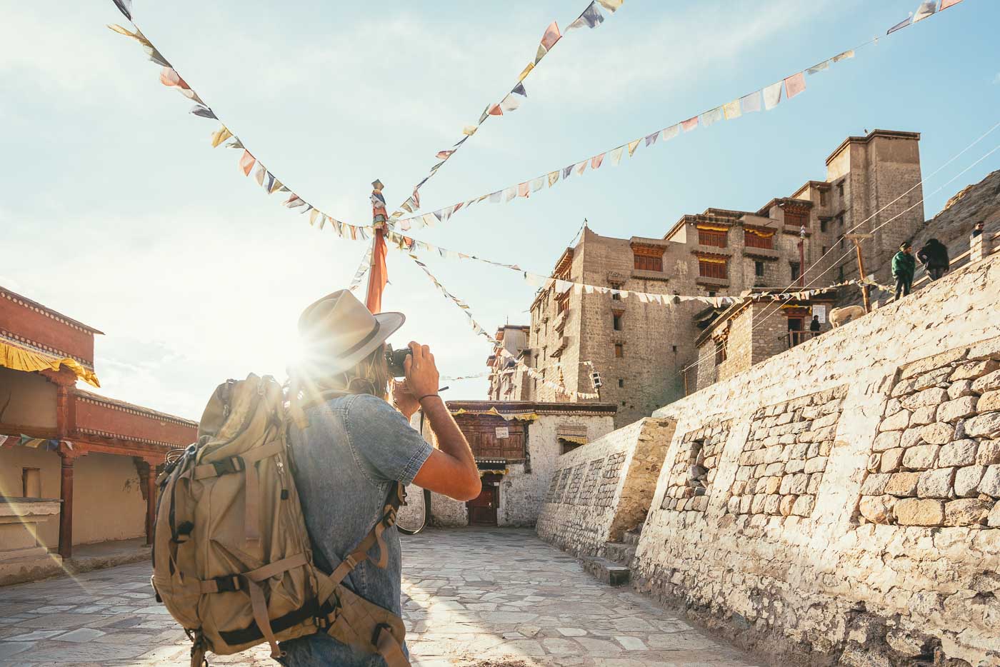 Photographer Stefan Haworth taking photos of Monastery in Ladakh India