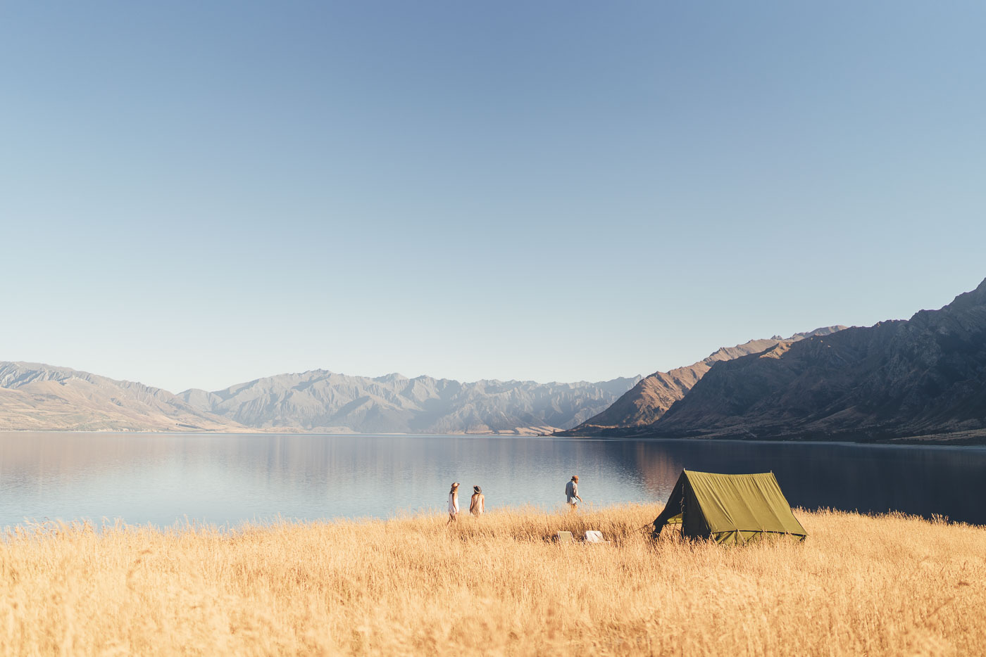 Camping on the edge of Lake Hawea in New Zealand on the Will and Bear Road trip