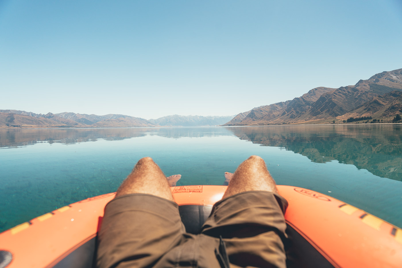 POV Floating across Lake Hawea in New Zealand on the Will and Bear Road trip