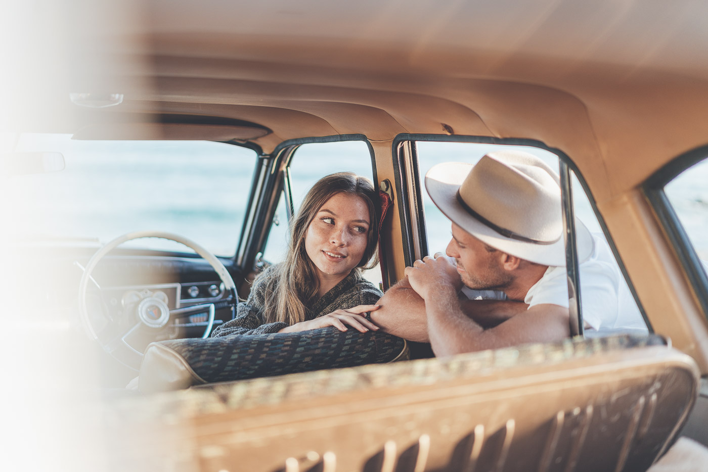 Couple chatting in the vintage car