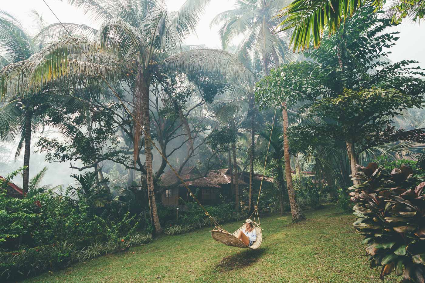 Jess Davis swinging in a hammock in the Philippines