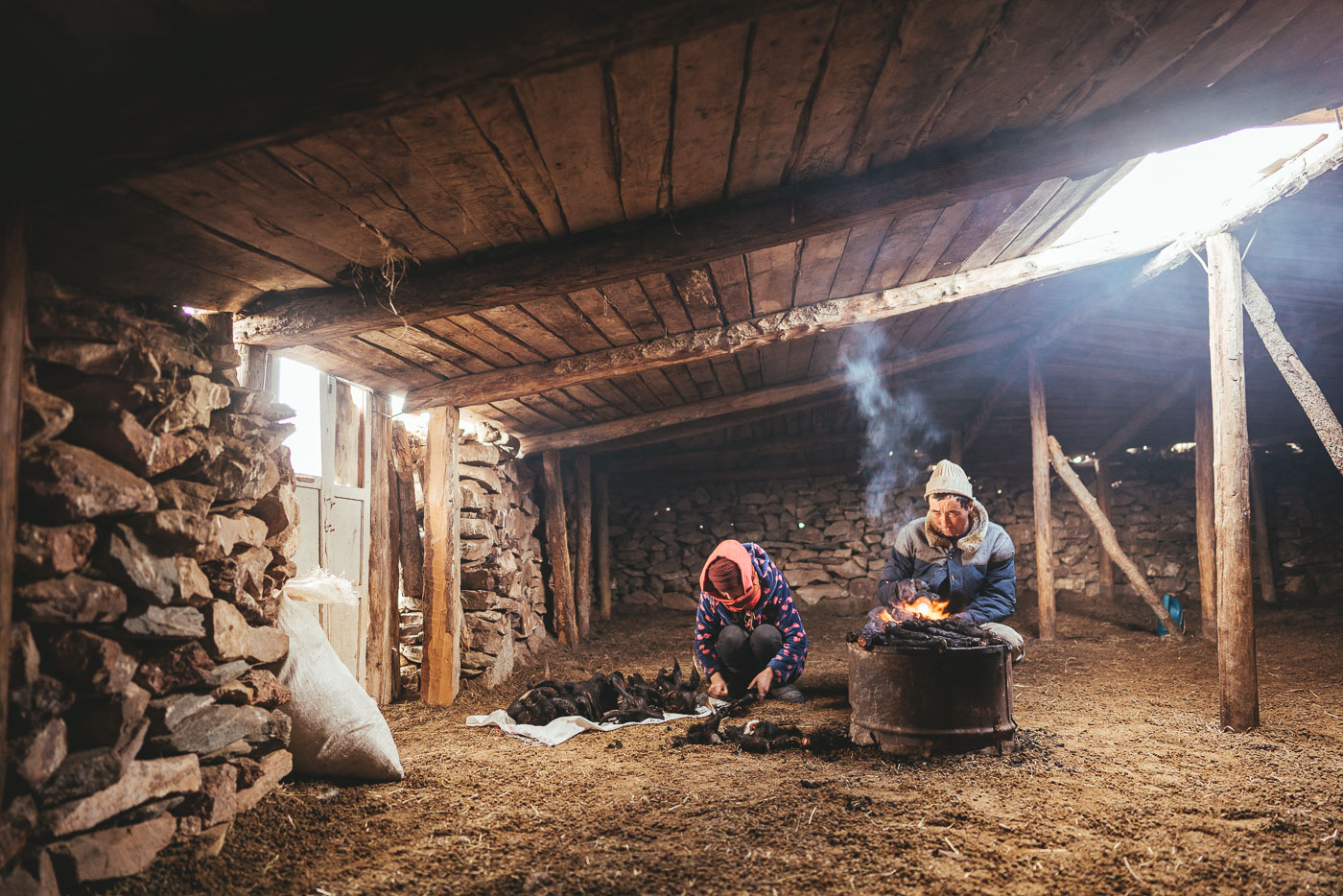 Mongolian farmers preparing the Goats heads for the winter meat harvest in western Mongolia. Captured by adventure photographer Stefan Haworth