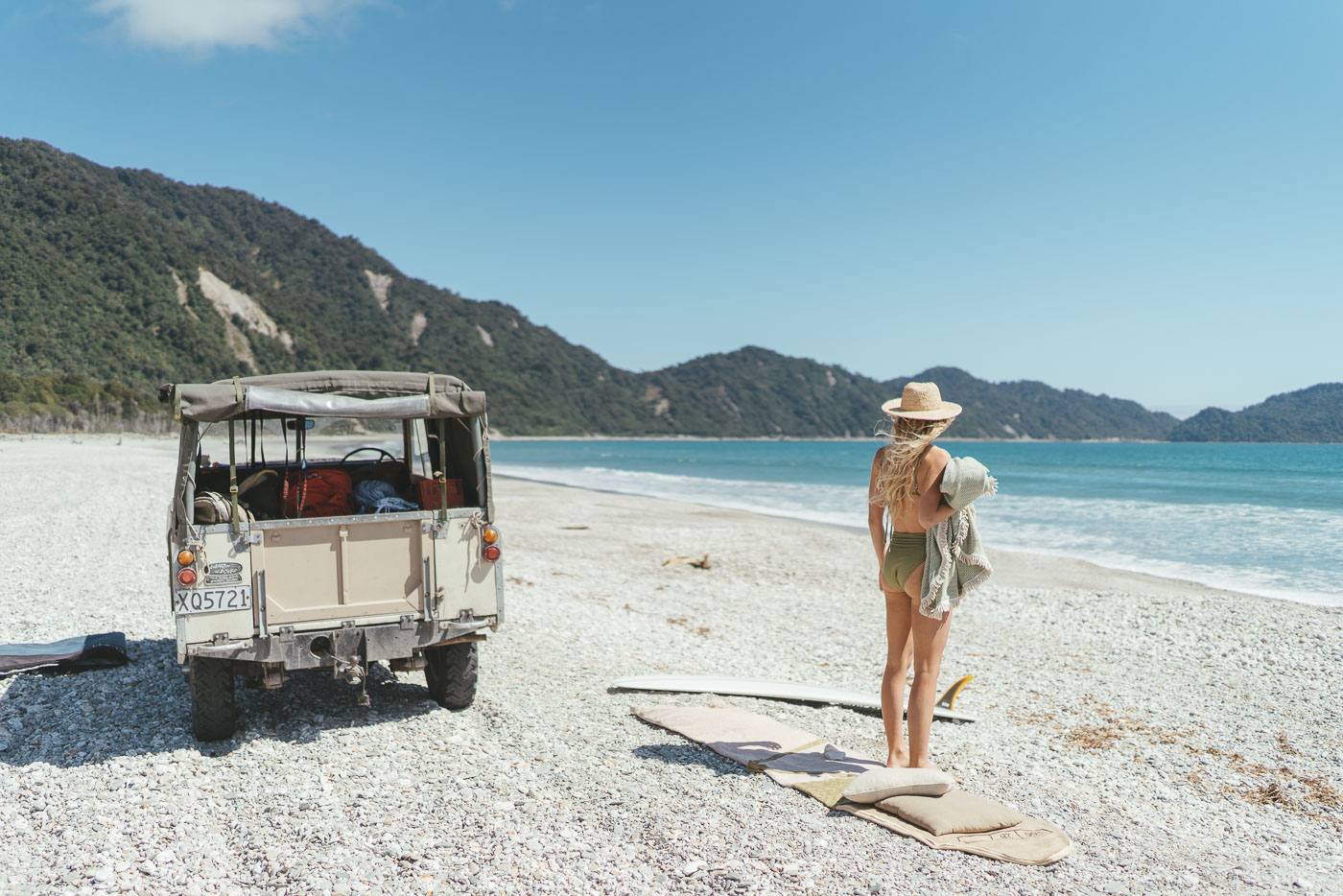 Jade Barclay Preparing for a surf on the west coast of New Zealand. Captured by Sony Ambassador and Photographer Stefan Haworth