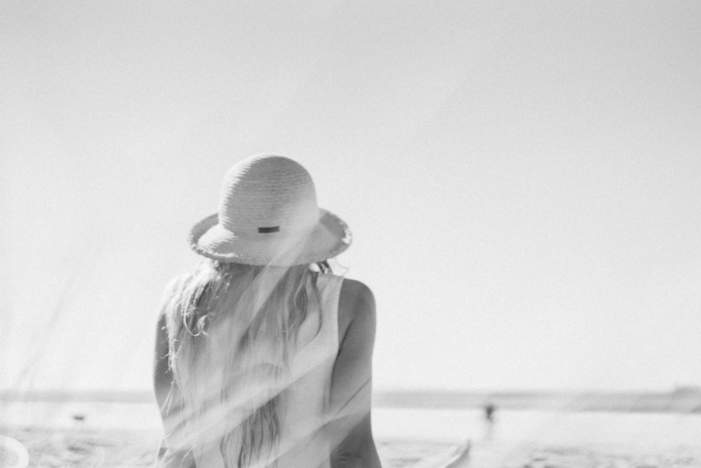 Artist Jade Barclay Relaxing on the beach at Great Barrier island