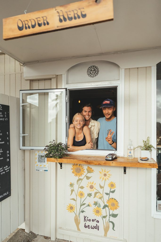 Ellen Taylor and Tiago Kerber at Zephyr Wainui cafe on the East Cape Road trip of New Zealand