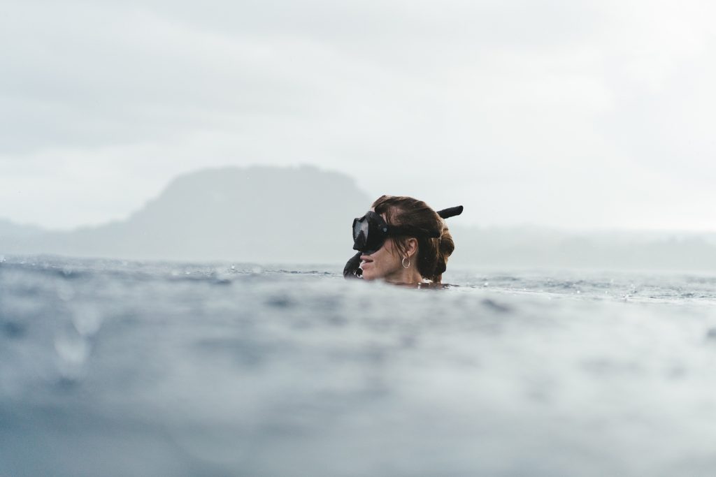 Jade Barclay snorkelling in a rainstorm at Espiritu Santo Island, Vanuatu