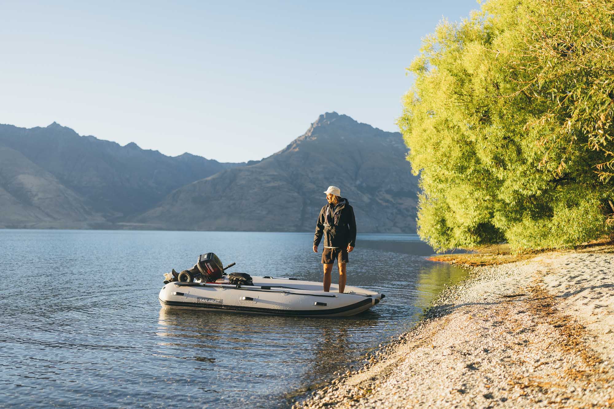 Stefan standing on Takacat Boat on Lake Wakatipu in Queenstown New Zealand