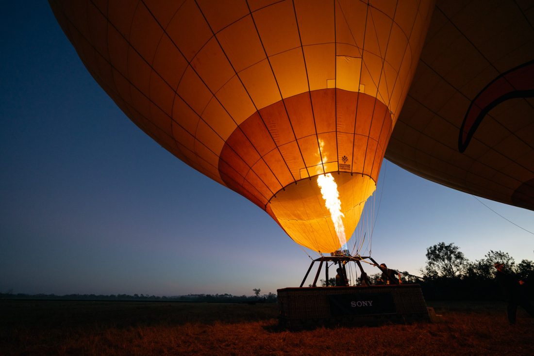 Flames inside Hot air balloon at sunrise at Sony Kando event in Port Douglas. Captured by Queenstown Photographer Stefan Haworth